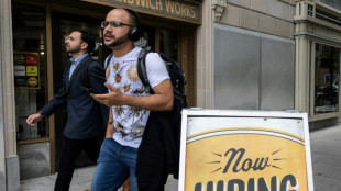 US stocks rally on slowing job gains, global markets mixed