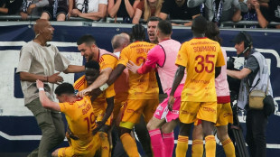 Four Bordeaux fans arrested after player assault stops French game