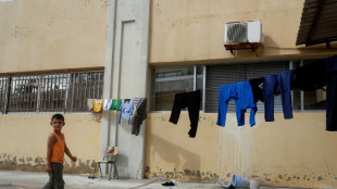 Fleeing Israel strikes, south Lebanon families move into schools