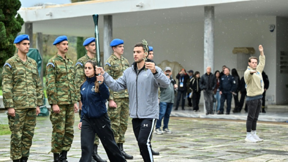 Rain forces changes to 2026 Winter Olympics flame ceremony