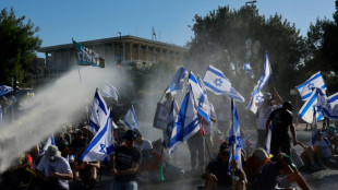 Protests rage as Israeli lawmakers to vote on divisive reforms