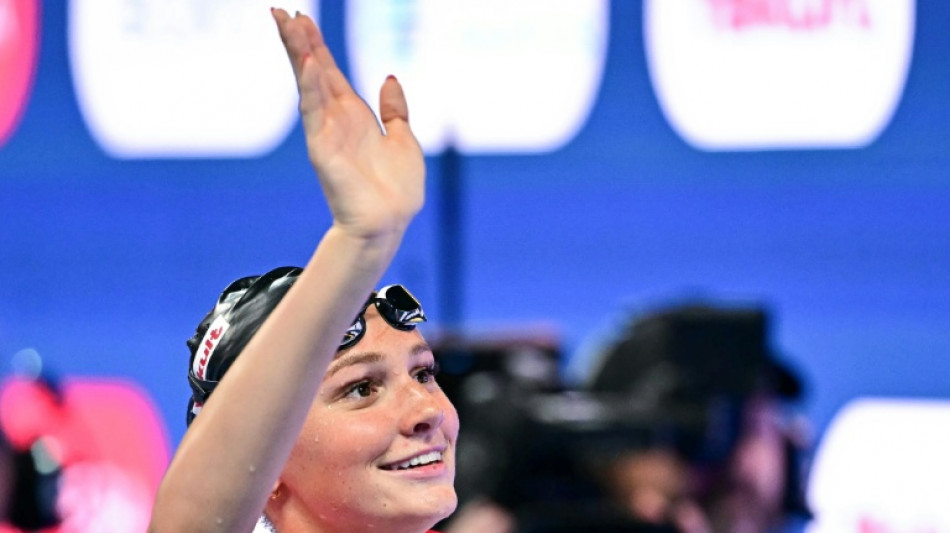 McIntosh wins again at swimming worlds as Yu, 12, just misses out