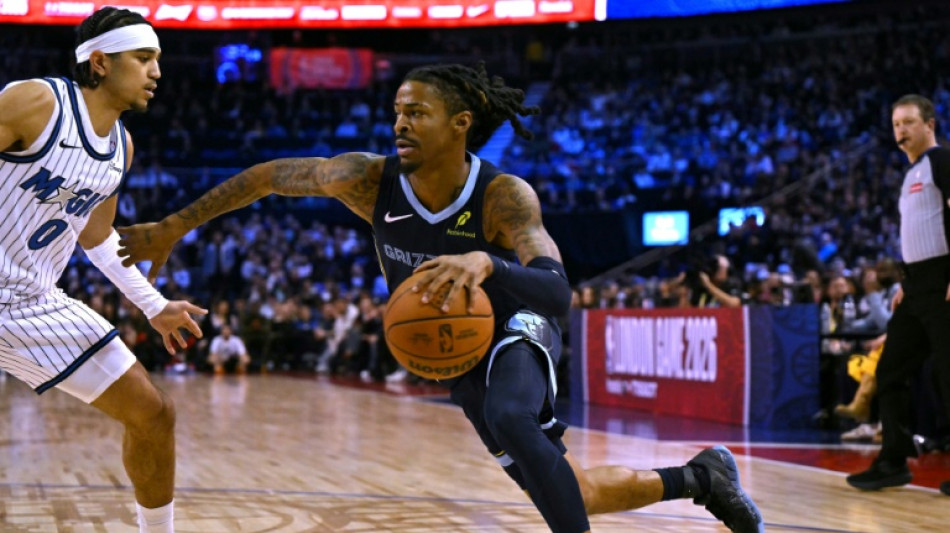 Grizzlies win in London as heckler interrupts US anthem