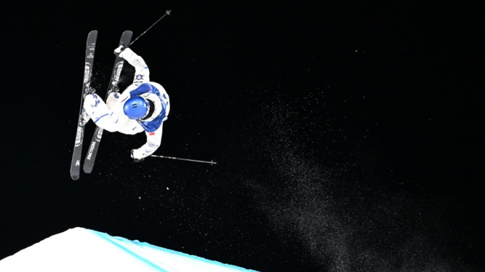 China's freeski star Gu recovers from crash to soar into Olympic big air final  