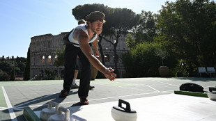 Curling attracts curious Romans under Colosseum's shadow