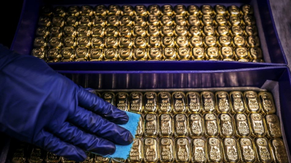 Stocks rise on electronics tariffs exemption, gold hits new high