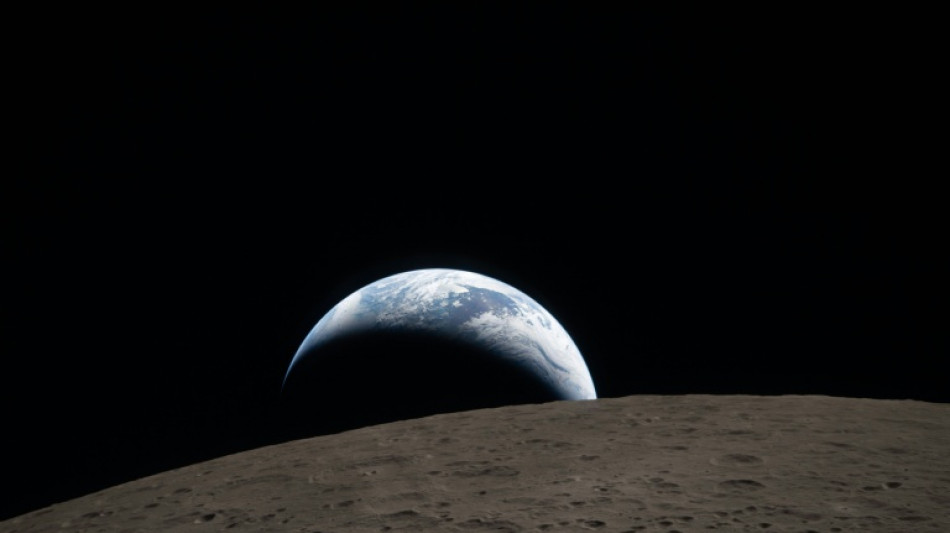 Publicada foto do 'p&ocirc;r da Terra', tirada por astronautas da Artemis II