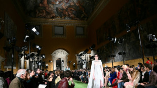 Valentino mixes 80s and Baroque splendour on Rome return