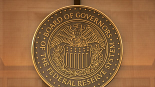 Stock markets waver before central bank rate decisions