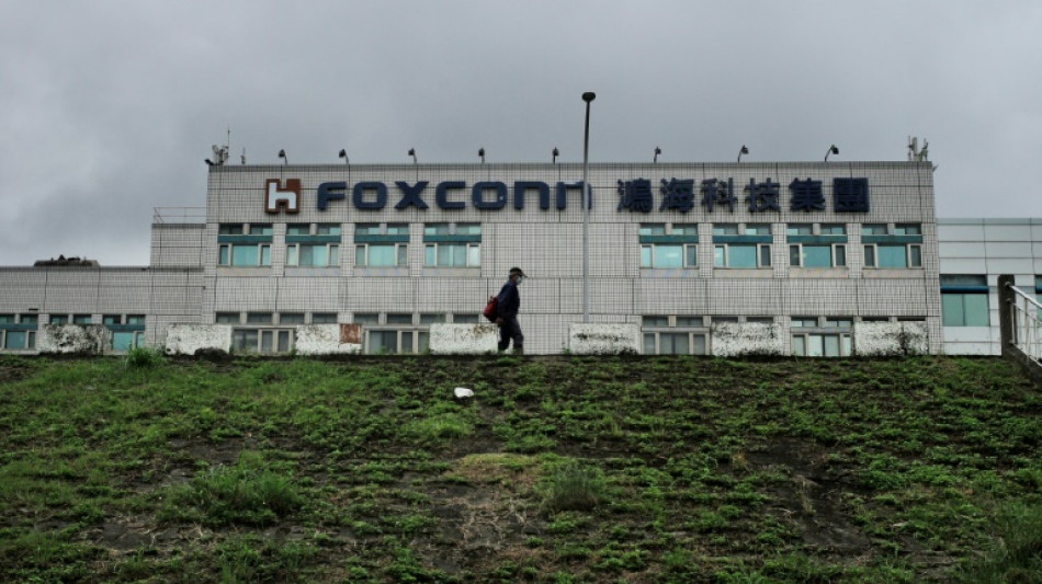 Taiwan defends Foxconn over China tax probe