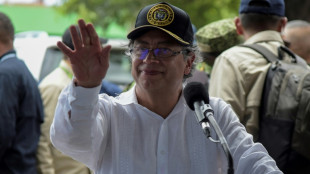 Colombia leader in rift-healing visit to Caracas after 9-year pause
