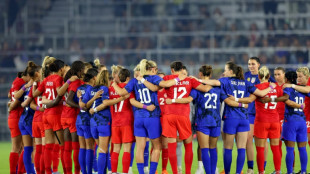 USA beat Canada, Brazil's Marta makes winning return 
