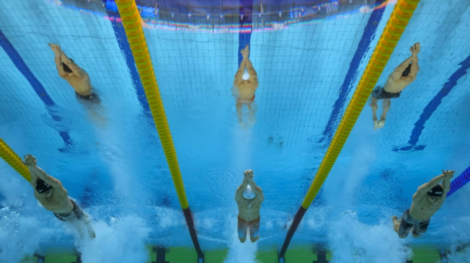 Dobletes de Popovici y Marchand en Mundial de Nataci&oacute;n, Dressel dice adi&oacute;s