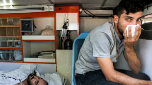 First evacuations from Gaza as refugee camp hit again