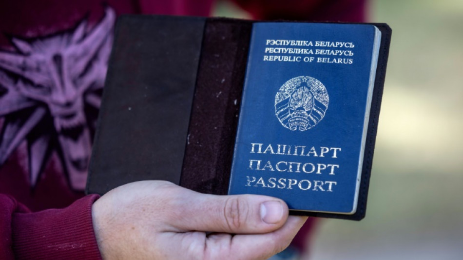 Stripped of passports, Belarusian exiles lose hope