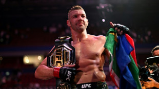 Du Plessis batters Strickland to retain UFC middleweight crown