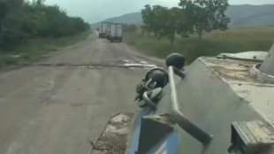 Karabakh rebels hand in arms and negotiate withdrawal