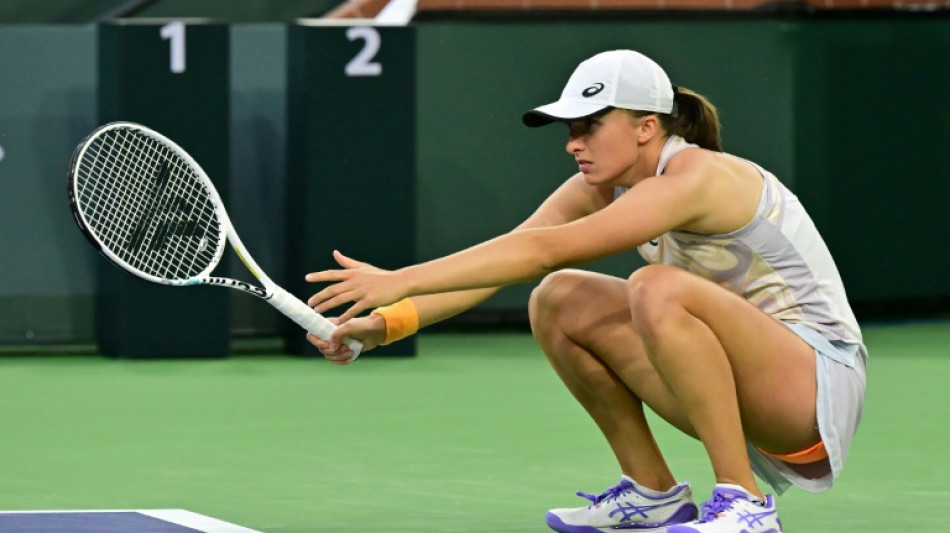 Rib injury threatens beaten Swiatek's Miami Open defense