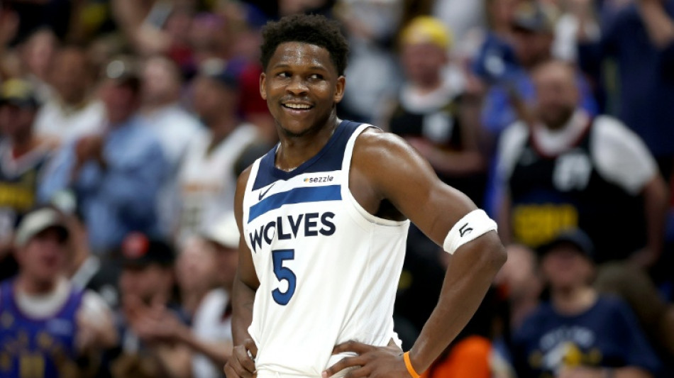Timberwolves battle back to stun Nuggets in NBA playoffs
