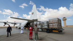 Aid for Gaza piles up as Israel rallies troops for invasion