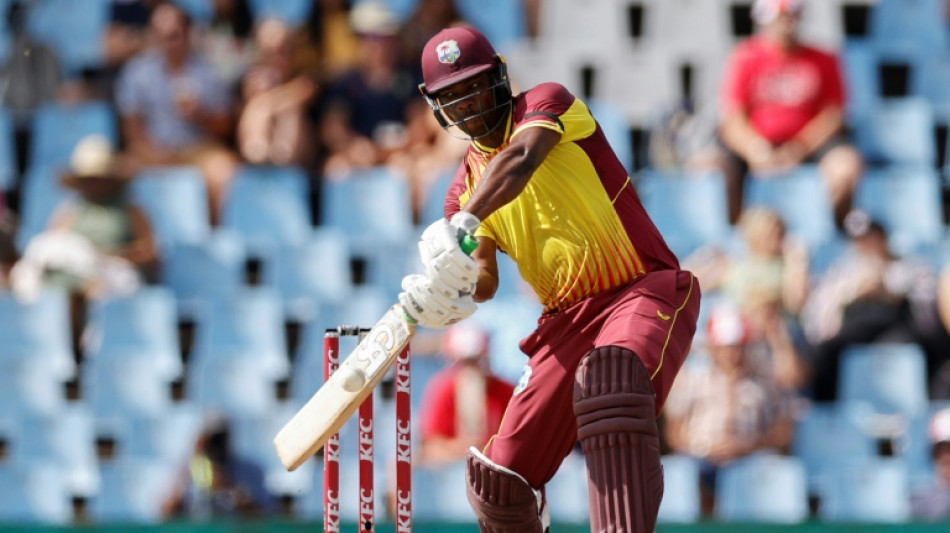 Charles hammers 39-ball century as W.Indies set new record