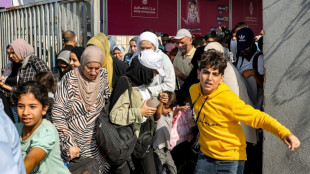 First wounded Palestinians flee shattered Gaza for Egypt