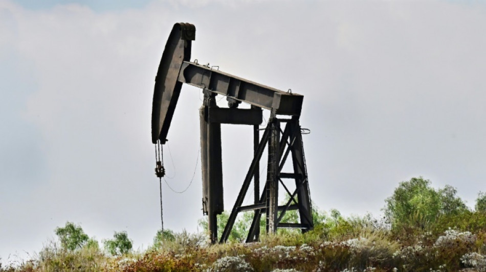 Oil slumps below $80 as stocks wobble
