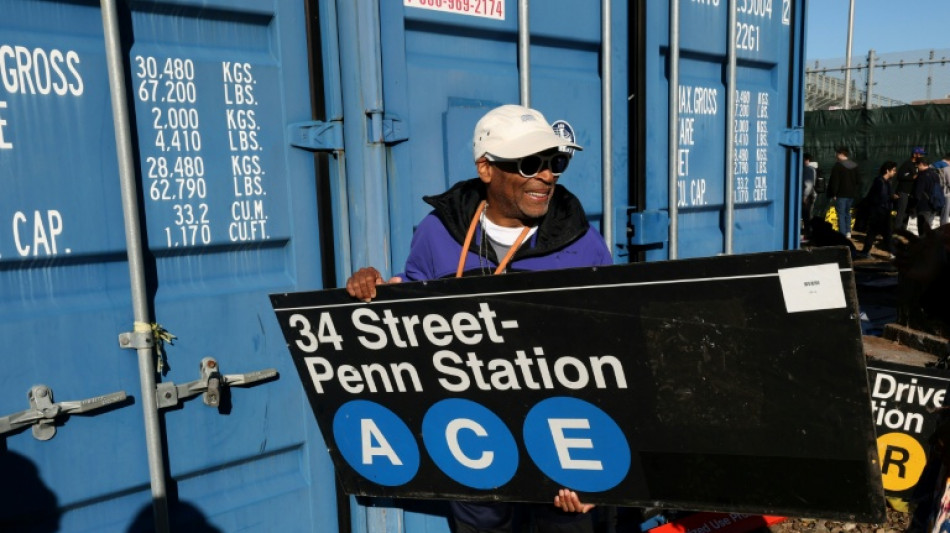 New Yorkers snap up discarded subway signs, seats at annual sale