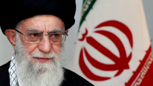 Iran leaders pay last respects to Khamenei as mourners gather