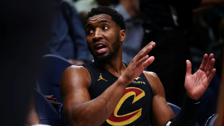 Mitchell leads Cavs over T-Wolves