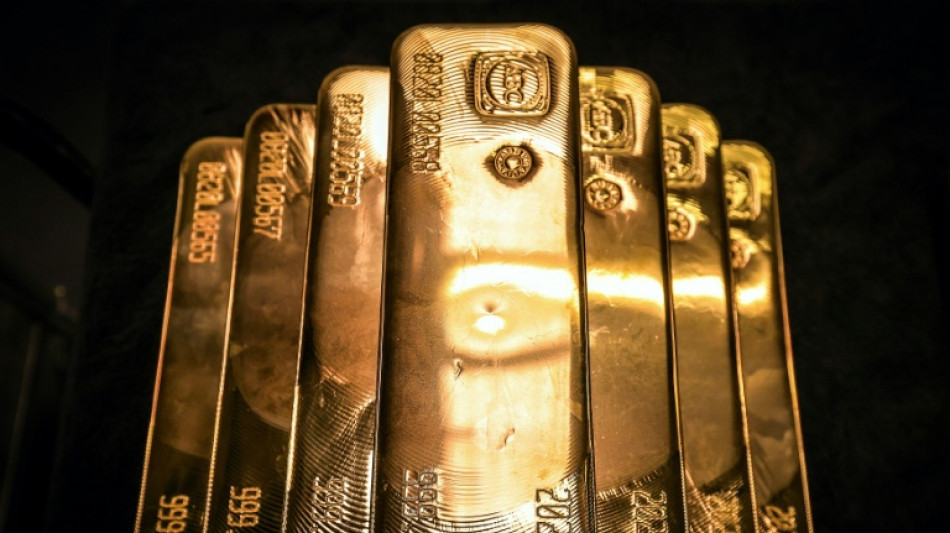 Gold hits peak, stocks sink on new Trump tariff threat