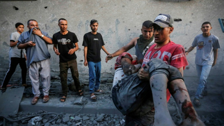 Besieged Palestinians await aid trucks as Israel pounds Gaza