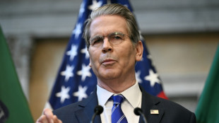 Stocks higher as traders weigh China-US row, tech earnings