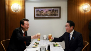 Japan PM heads to Seoul as ties warm over North Korea threat