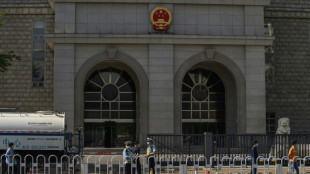 Australia says writer given suspended death sentence in China