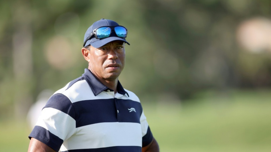 Woods undergoes lower back disc replacement surgery