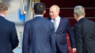 Putin in China to meet 'dear friend' Xi