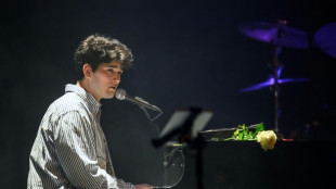 Tears and smiles at tribute concert for Swiss fire victims