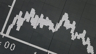 Asian markets mostly down on worries over rate hikes, inflation
