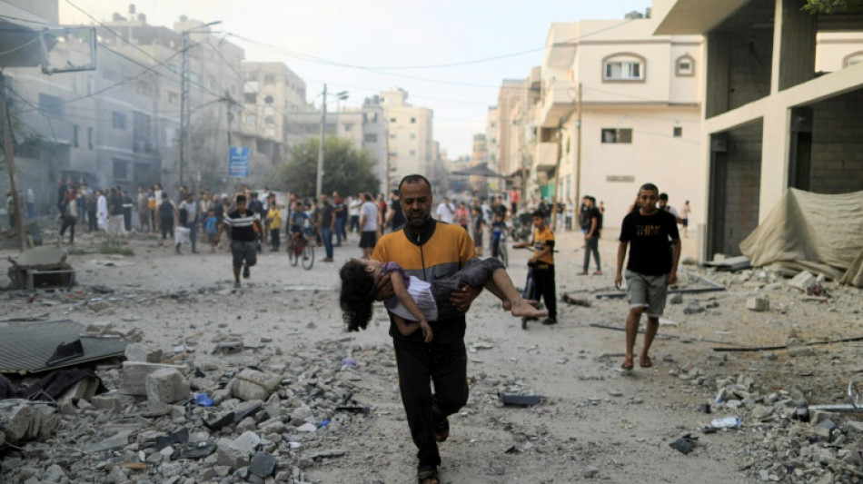 A week into war, Gazans flee homes as Israeli ground offensive looms
